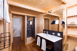 Each pod is conveniently equipped with a complete bathroom.