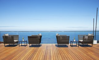 Spain's Basque Coast Gets a New Modern Hotel With a Michelin-Starred Restaurant - Photo 11 of 12 - Shown here is a view of one of the terraces, which is furnished with Kettal's Bitta collection by Rodolfo Dordoni. 