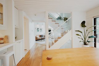 The public space includes a dining room and full kitchen. 