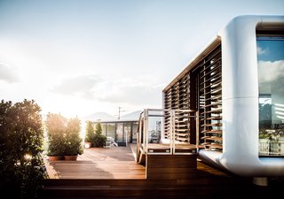 Stay in a Prefab Cube Placed Atop a Midcentury Hotel in Austria - Photo 3 of 8 -
