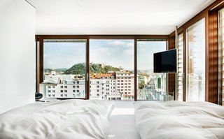 Stay in a Prefab Cube Placed Atop a Midcentury Hotel in Austria - Photo 4 of 8 -