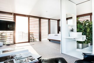Stay in a Prefab Cube Placed Atop a Midcentury Hotel in Austria - Photo 5 of 8 -