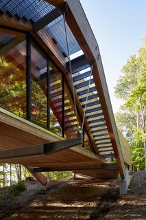 A Unique Home in the Canadian Forest That Doubles As a Bridge - Photo 2 of 11 -