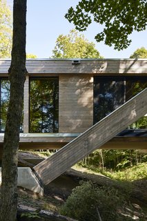 A Unique Home in the Canadian Forest That Doubles As a Bridge - Photo 8 of 11 -