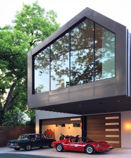 This Austin Home Was Designed to Showcase a Vintage Car Collection - Photo 1 of 20 -