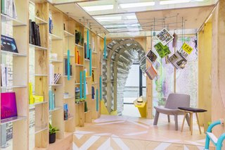 The central volume of the home is occupied by a "library" featuring books which can be retrieved randomly by pulling on the ropes which hang from the ceiling.