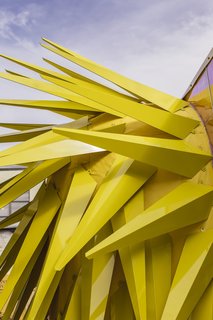 MINI LIVING always makes an effort to work together with local designers on their projects and the bright yellow metal spikes on the exterior were created by the MINI LIVING design team’s NYC-based collaborators Bureau V— injecting an element of surprise into the design.