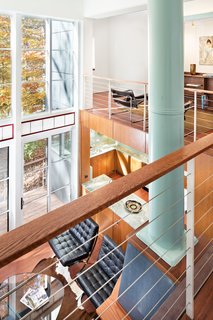 A bridge on the second floor leads from the master bedroom to the library.