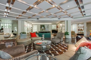 Bright and airy, the living area is a large open-plan space designed for entertaining.