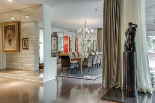 The living area opens to the dining room area.