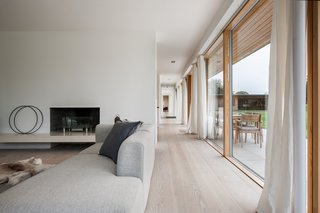 The corridor allows for views that extend the entire length of the home. 