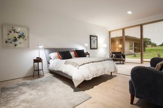 The master bedroom offers a view of the exterior annex. 