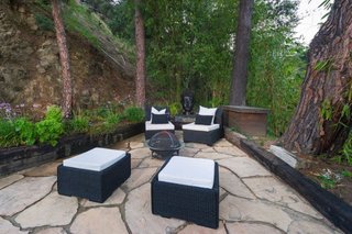 A backyard fire pit for cool California evenings 