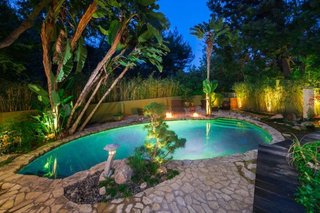 The lagoon-like swimming pool