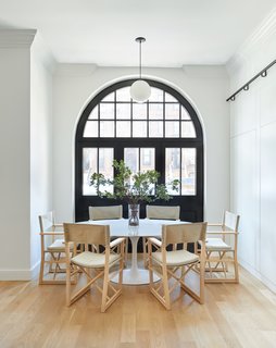 Two Renovated Carriage Houses in Brooklyn Hit the Market - Photo 7 of 13 - The original archway, through which horse-drawn carriages once entered, has been preserved and updated with custom glass-and steel-windows. 