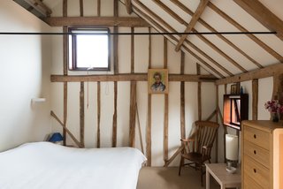 A simple farmhouse-style bedroom.