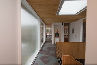 A skylight provides even more natural light to the central stairwell. 