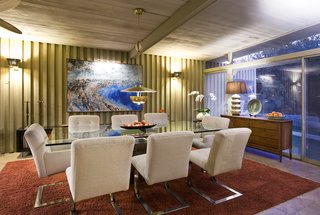 A Luminous Palm Springs Midcentury Asks $3.35M - Photo 8 of 16 - The dining room leads to a screened-in porch. 