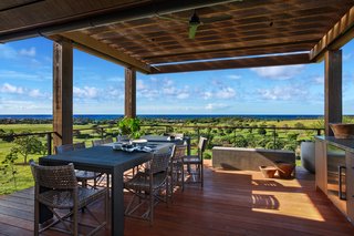 A Breezy Hawaiian Residence by Olson Kundig Hits the Market at $6.95M - Photo 9 of 14 - A covered exterior dining area around the pool