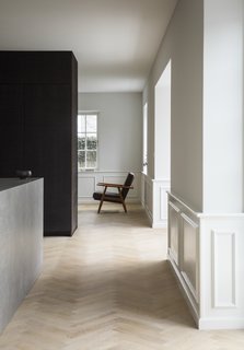 Classic moldings were preserved, adding a historic flavor, while playing off sleek, contemporary touches. 