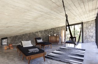 The mezzanine level provides a relaxing space for lounging.