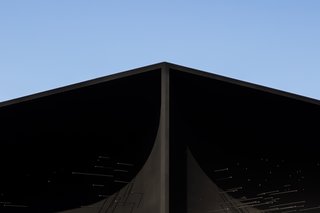 The building also references the traditional temple architecture of South Korea. 
