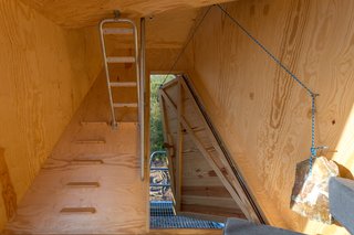 Go Off The Grid With These Remote Rental Cabins in Cornwall - Photo 7 of 12 - The cabins come equipped with minimalist interiors and pulley-operated doors. 