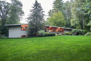 Own an Iconic Midcentury in New Canaan For $1.55M - Photo 1 of 12 - This beautiful home is set on three acres in the iconic enclave of New Canaan, Connecticut.