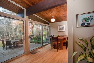 Own an Iconic Midcentury in New Canaan For $1.55M - Photo 7 of 12 - This corner could be an additional dining area, as well as a quiet reading nook. 