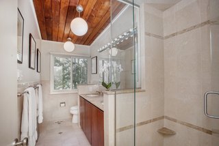 Own an Iconic Midcentury in New Canaan For $1.55M - Photo 11 of 12 - Here is a peek at one of the bathrooms.