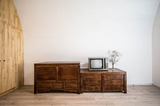 Traditional furniture was kept in the interior, signifying a homage to the past. 
