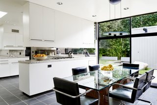 The eat-in kitchen is bright and airy with lots of storage space. 