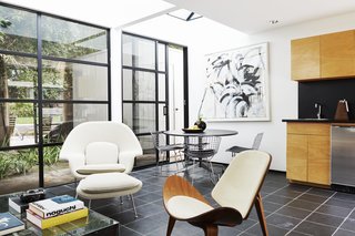 A den offers additional space for entertaining. 
