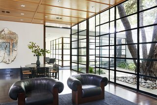 With high ceilings and lots of usable space, the bright and spacious living area overlooks the courtyard. 