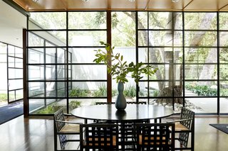 The glass wall of windows allows for plenty of natural light. 
