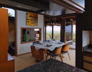 A Contemporary Beach Retreat on California's Central Coast Asks $2.3M - Photo 4 of 10 - The dining room also enjoys bay views.