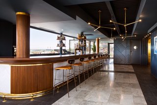 The seventh floor is home to The Rooftop, a lounge and bar, set in a glass box adjacent to the buildings' rooftop terrace and historic tower. 