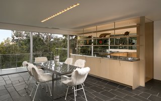 The kitchen opens to the dining area and living room. 