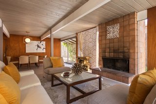The formal living room is adjacent to the dining area.