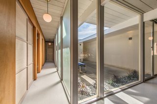 A hallway overlooking the atrium. 