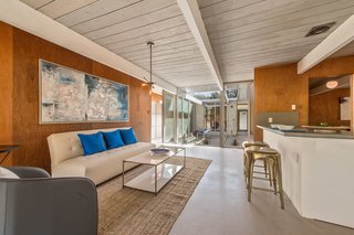 Original details, including the Philippine mahogany walls, offer authentic midcentury charm. 