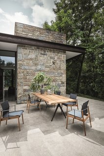 Gloster’s wood can always be traced back to its origin, and the company only harvests teak that it has planted. The Raw Split Dining table with a contoured edge by Pedersen is a contemporary, unfinished, minimalist design with a strong emphasis on the materiality. A close-grained hardwood with a high natural oil content, teak is exceptionally hard wearing, highly resistant to rotting, and almost impervious to the effects of sun, rain, or snow.