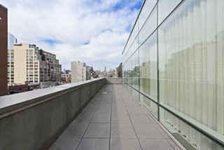 Gorgeous city views are consistently available, thanks to the terrace that wraps around the perimeter of the unit.