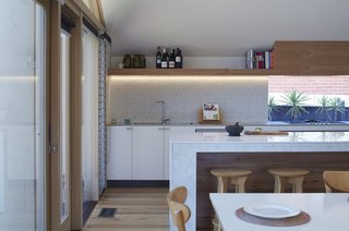 The extension created an open kitchen and dining area, as well as additional interior space.