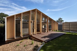 The pitched roof reduces the extension's surface area to 12 percent less than that of a flat-roofed extension, creating a more compact building envelope. This translates to less material needed for construction and less space to heat or cool. 