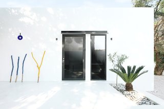 Rent This Modular Micro Cabin For Your Next Grecian Getaway - Photo 9 of 13 - The Monocabin also houses a quaint patio that's perfect for outdoor gathering. 