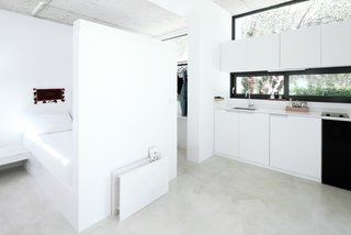 Rent This Modular Micro Cabin For Your Next Grecian Getaway - Photo 4 of 13 - Many of the furniture featured in the home are custom-built pieces. For instance, the shelf shown here was designed by Mandalaki. 