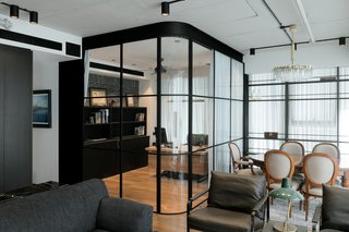 The concrete ceiling was intentionally left exposed so the lighting systems are visible. 