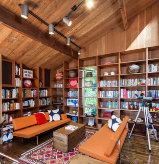 The library's built-in shelves are laden with books.