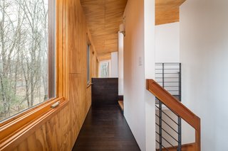An Eco-Friendly Connecticut Home Wants $650K - Photo 7 of 10 - The large windows bring in so much natural light that the home rarely needs electrical lighting throughout the daytime.